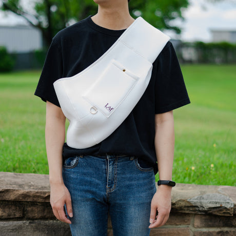 sling carrier, sling carrier with cell phone pouch
